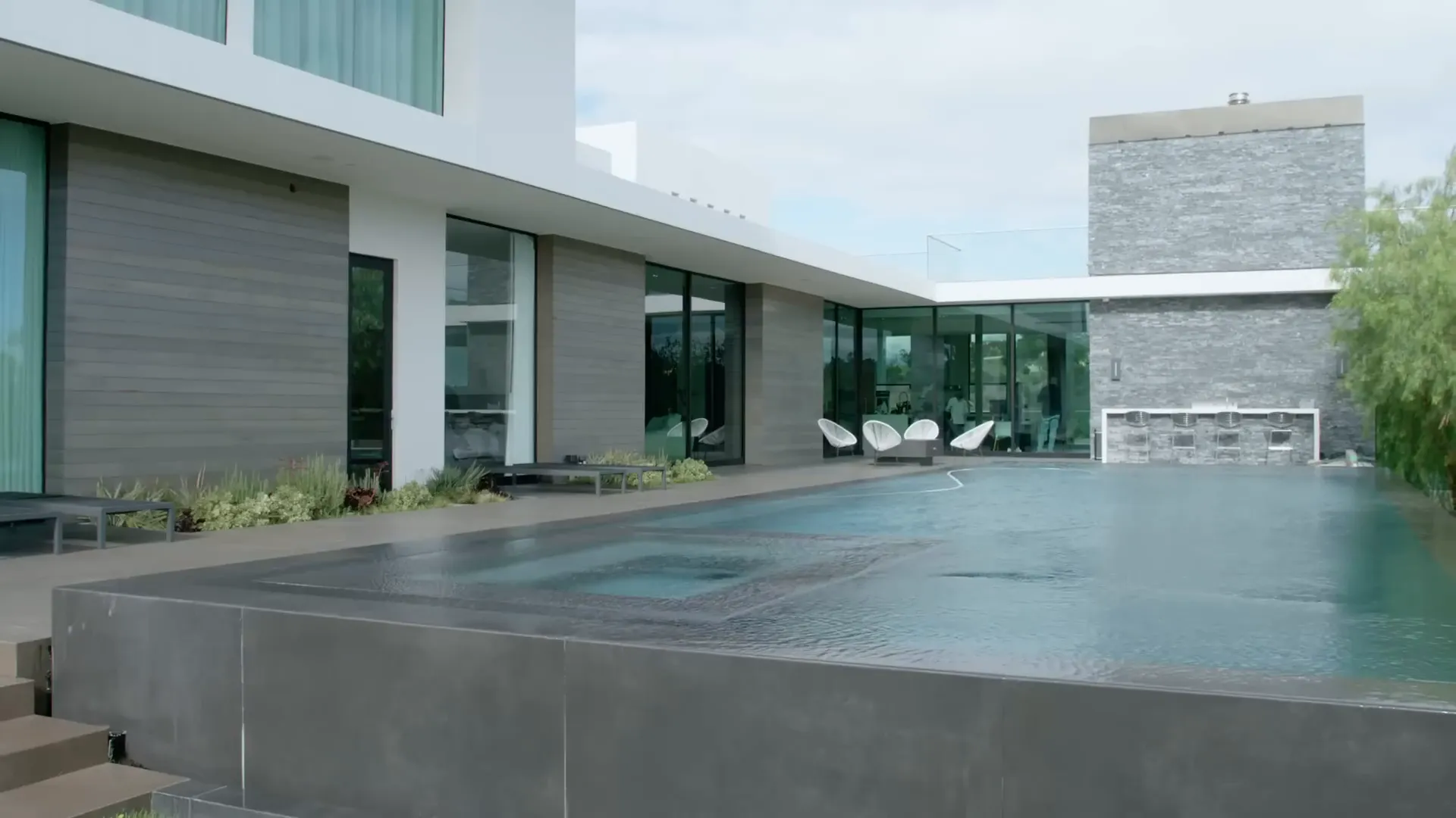 Zedd showcasing the pool area