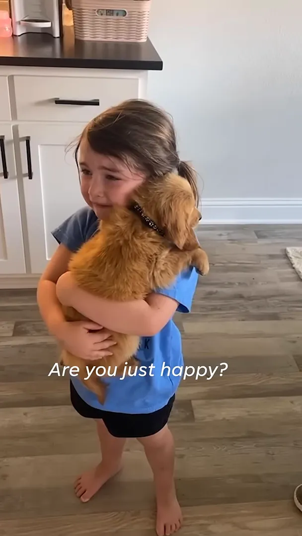 Haidyn sobbing with happiness while holding Butters