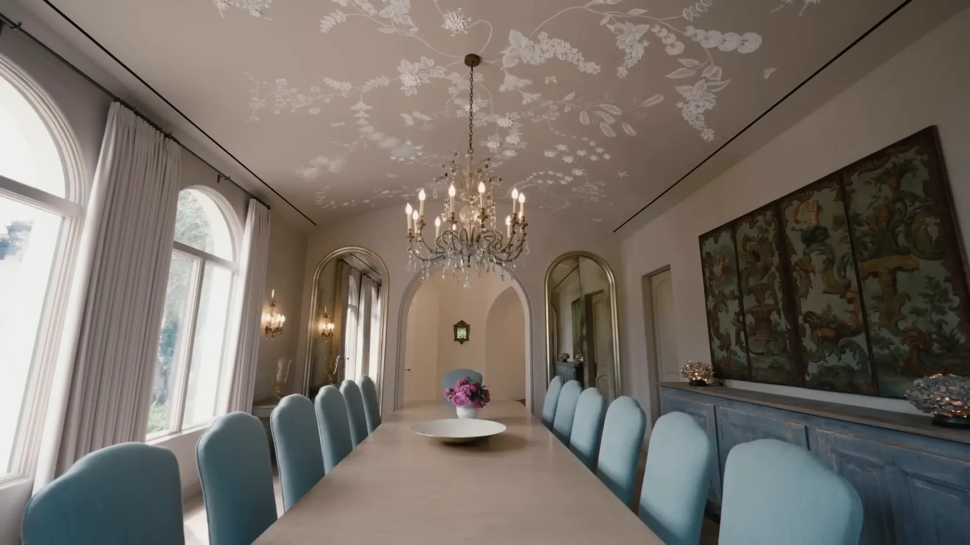 Sofía Vergara in her formal dining room, showcasing the hand-painted ceiling.
