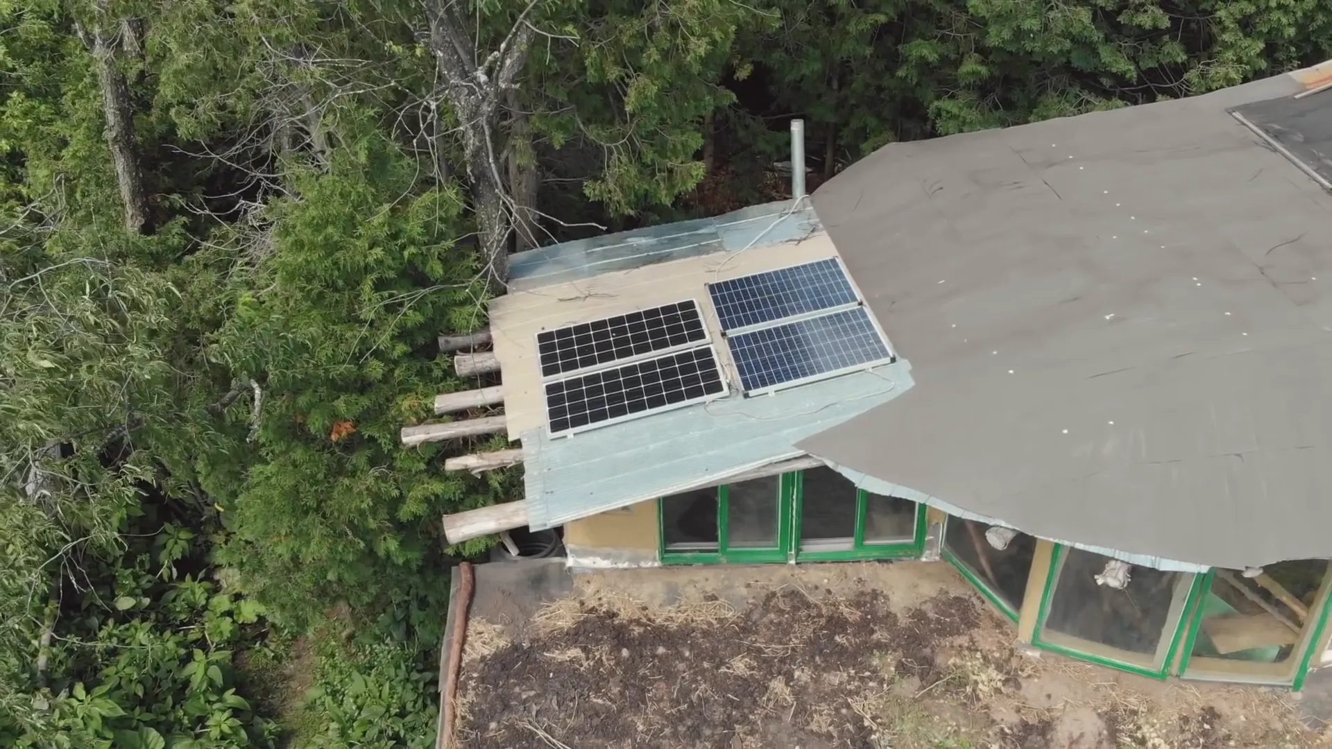 The solar panels on their cob home