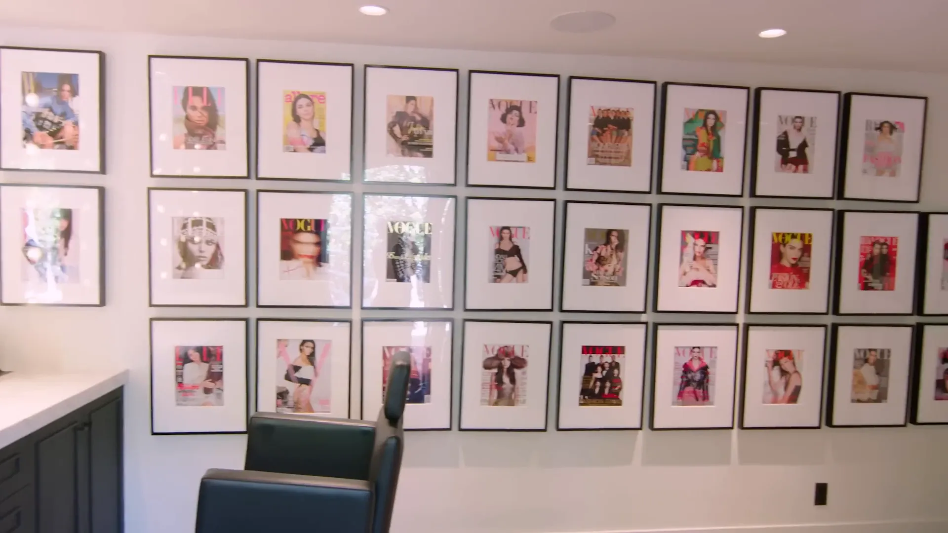 Wall of magazine covers in the glam room