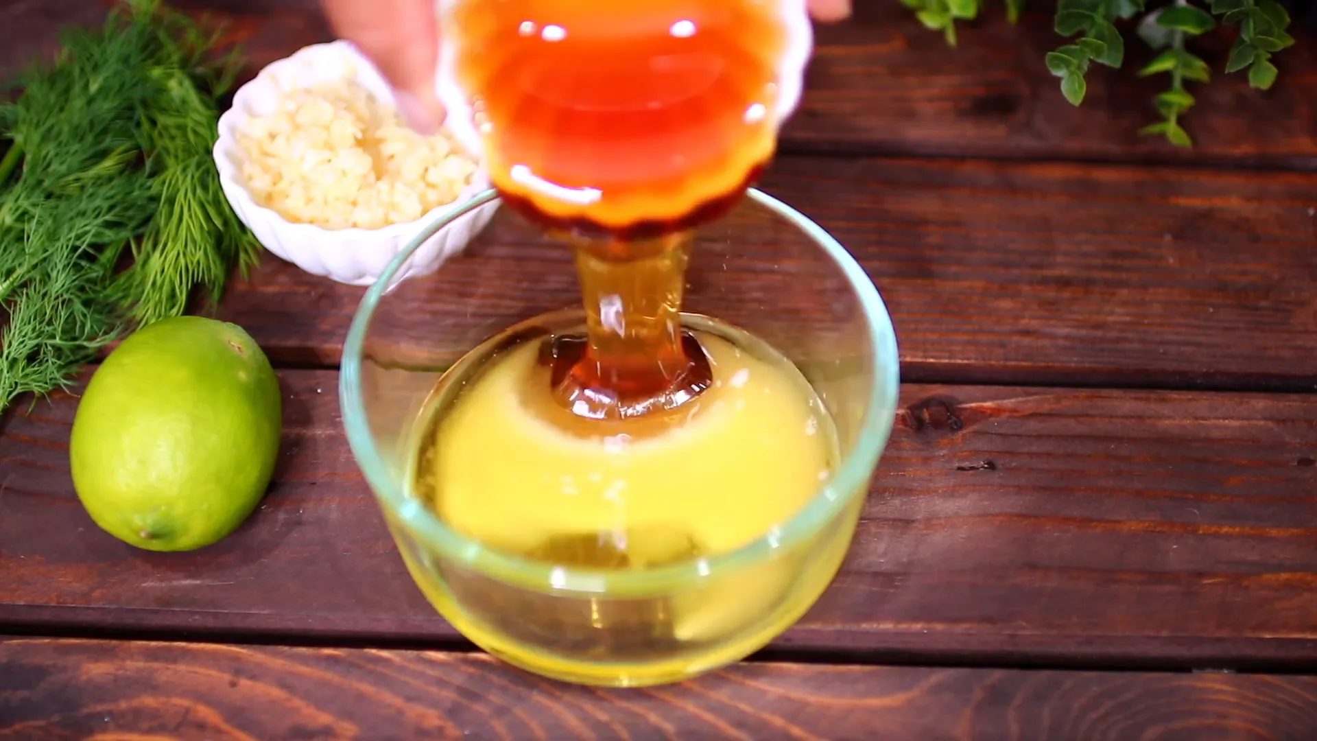 Adding honey and minced garlic to the marinade