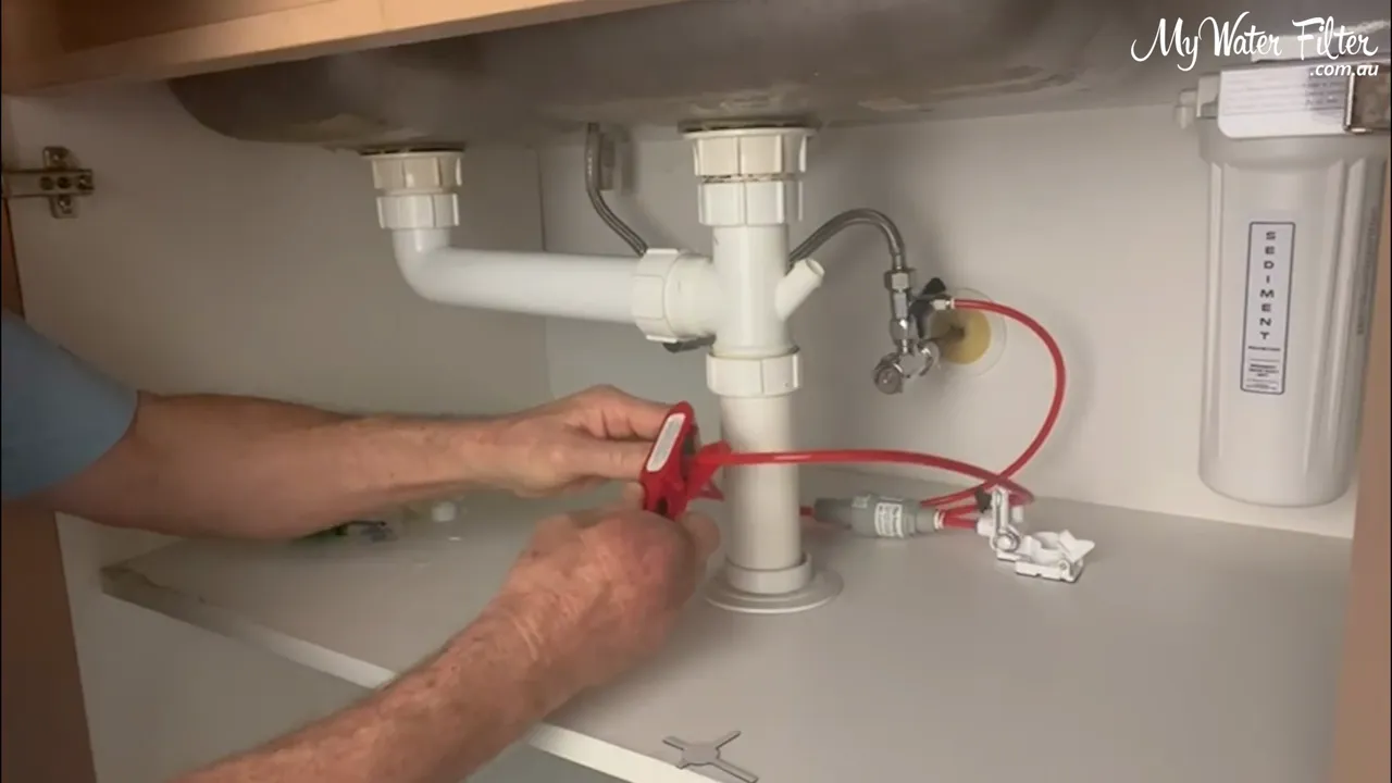 Using a tube cutter to make a neat hose cut