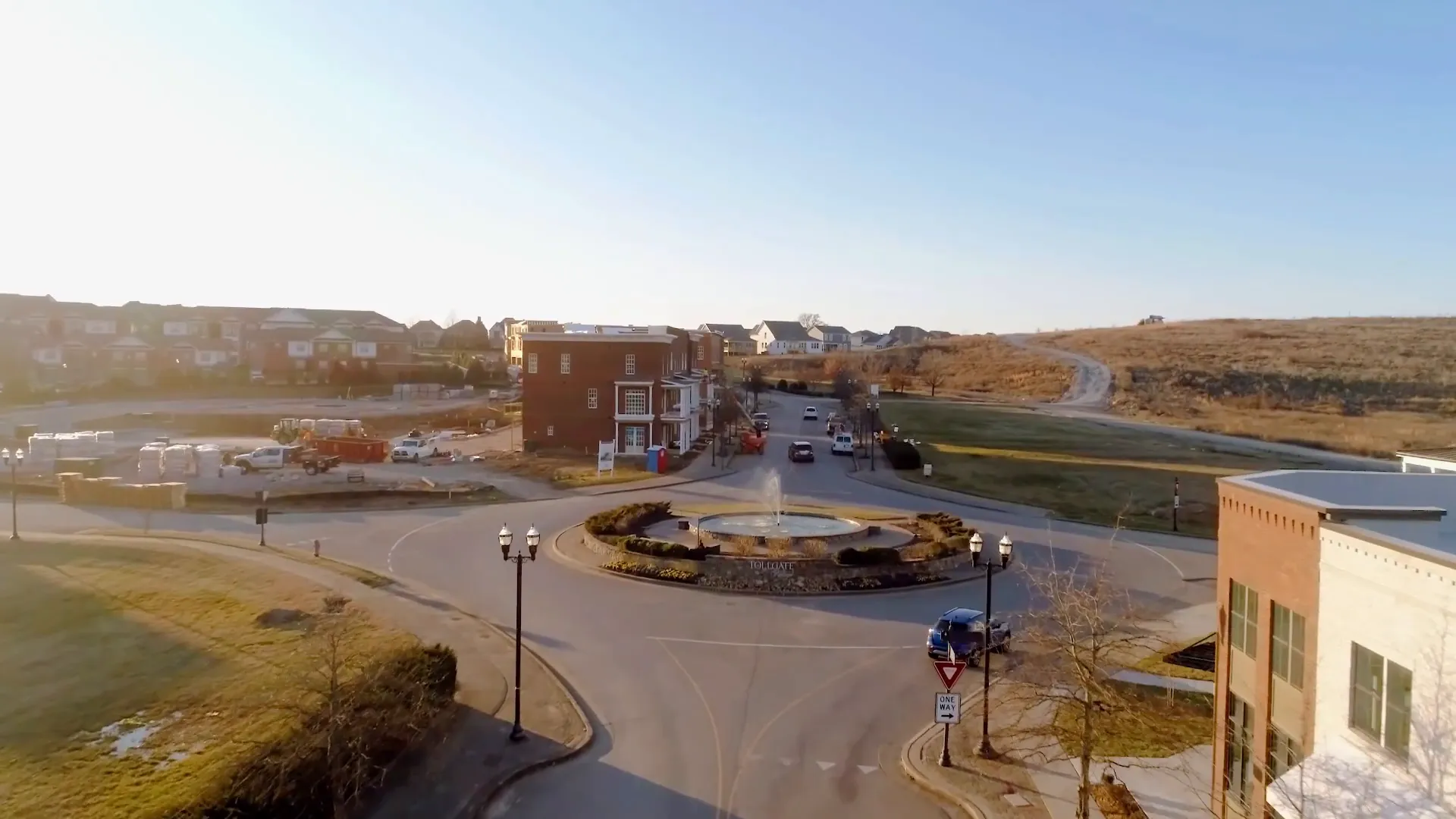 Tollgate Village streetscape with shops and green spaces