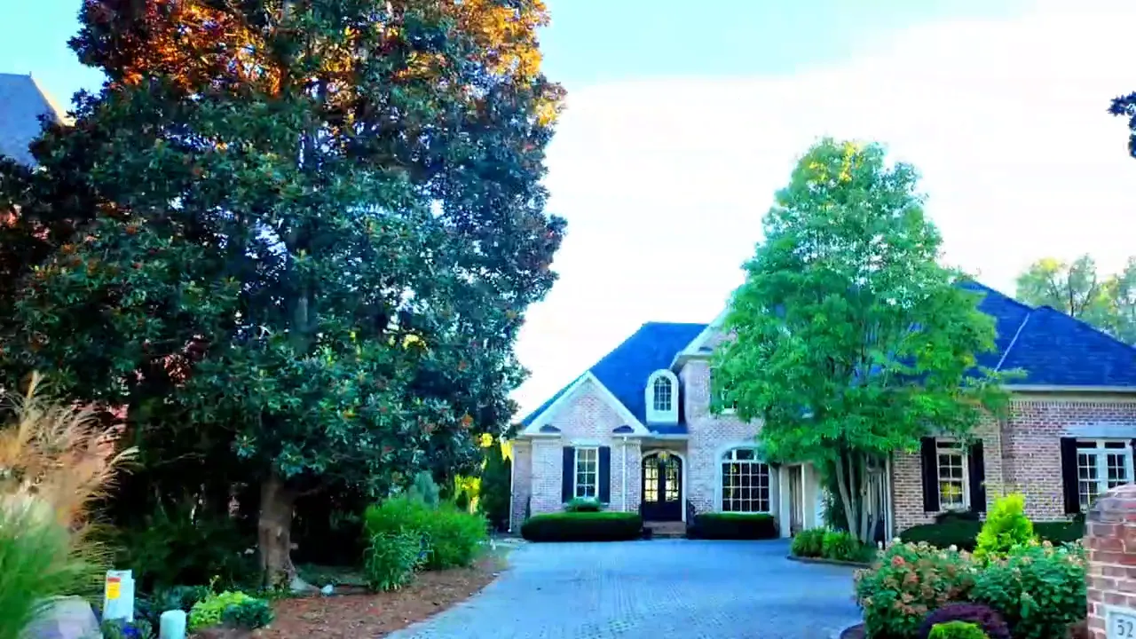 Mature tree-lined lot typical of Brentwood Country Club