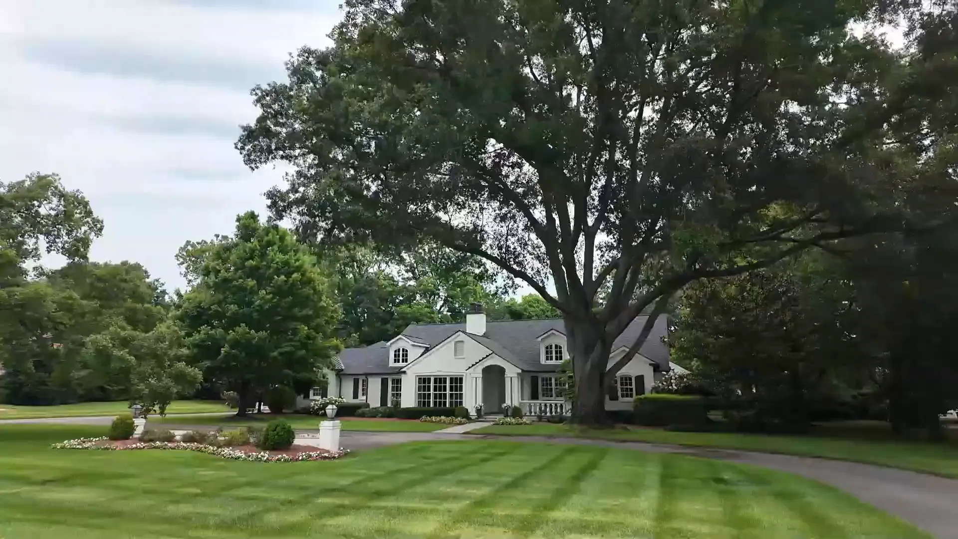 Elegant estate home with manicured grounds in Oak Hill
