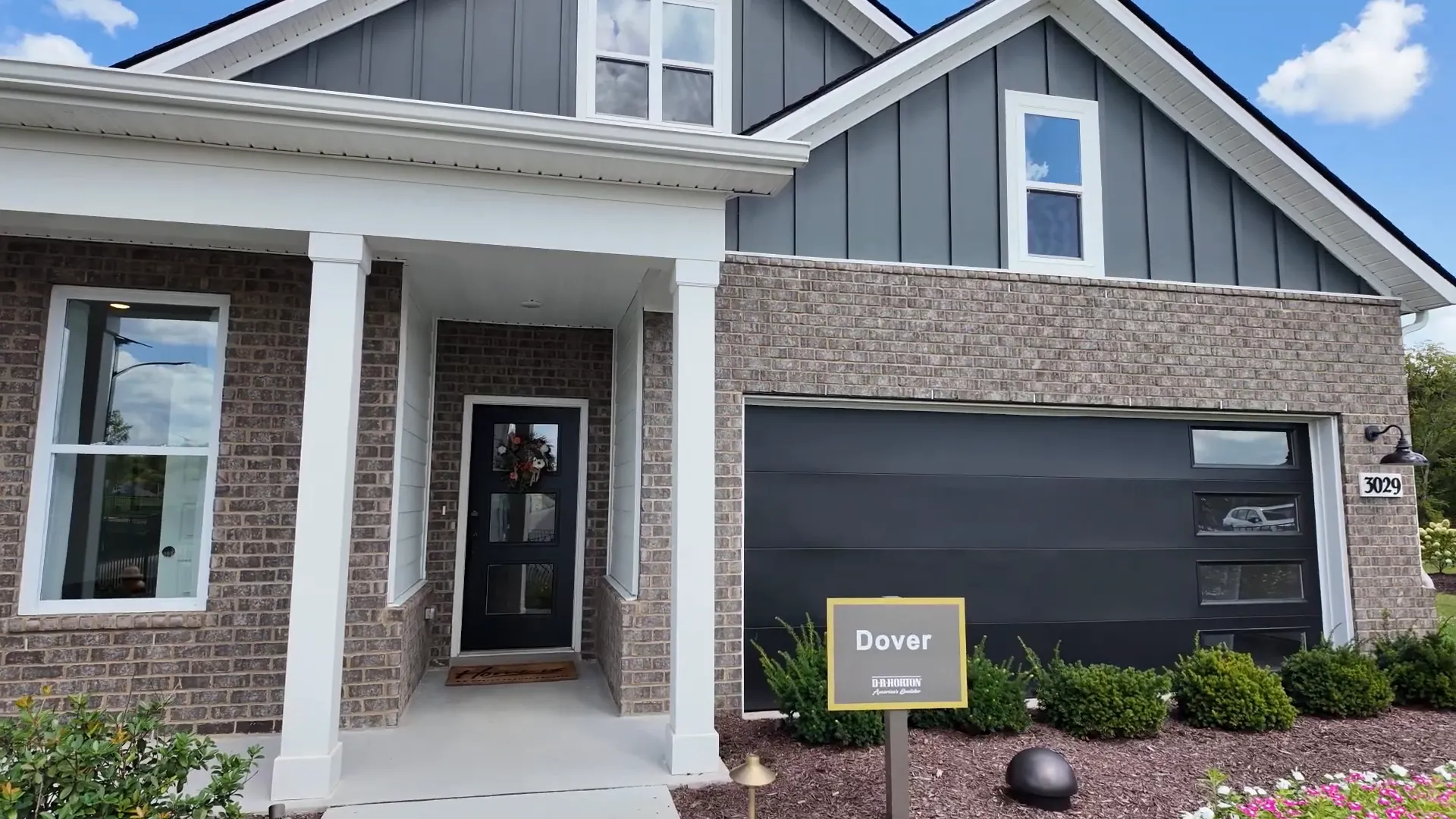 Exterior of villa units with attached garages