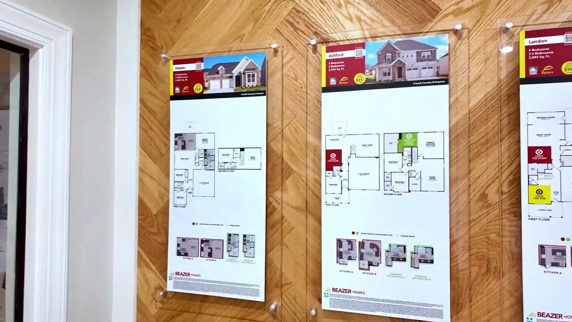 Primary bathroom layout options displayed in builder showroom