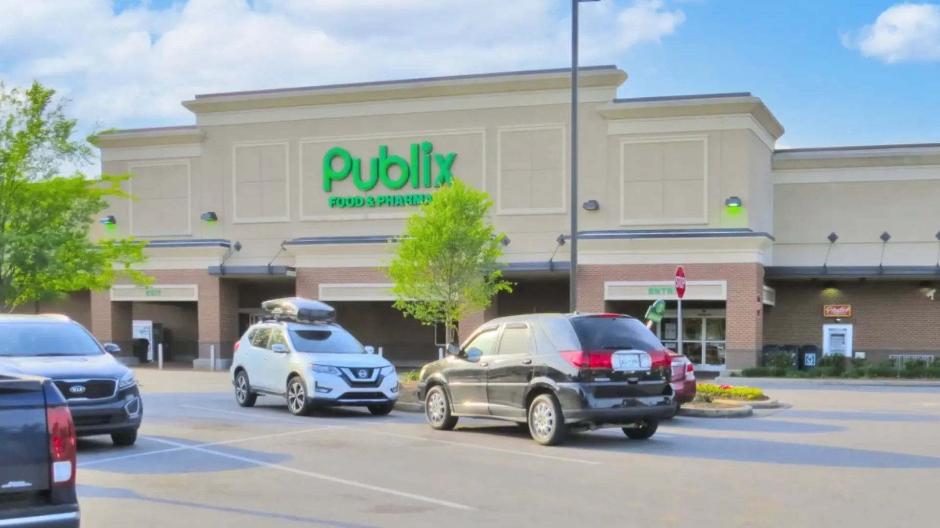 Grocery and retail options: row of stores and parking