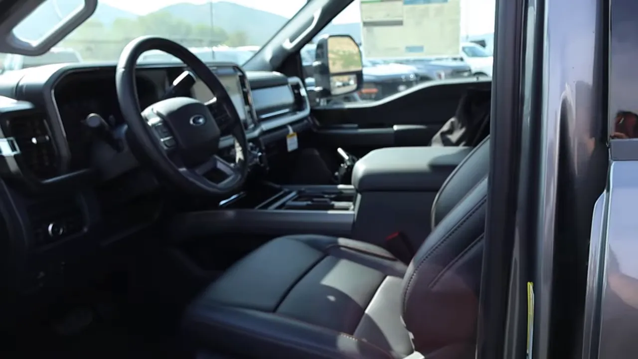 Front driver seat, dashboard and center console of 2026 Ford F-350 Lariat interior