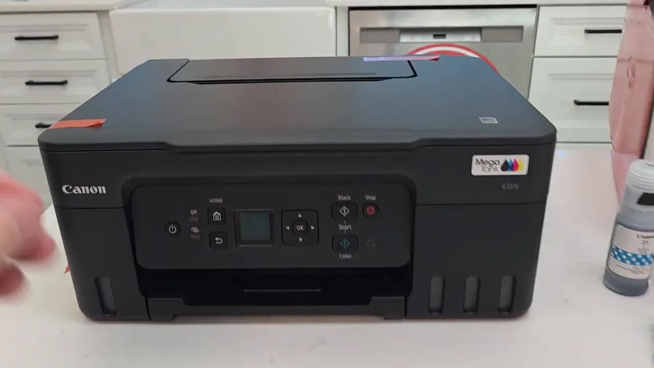 Removing tape from printer exterior