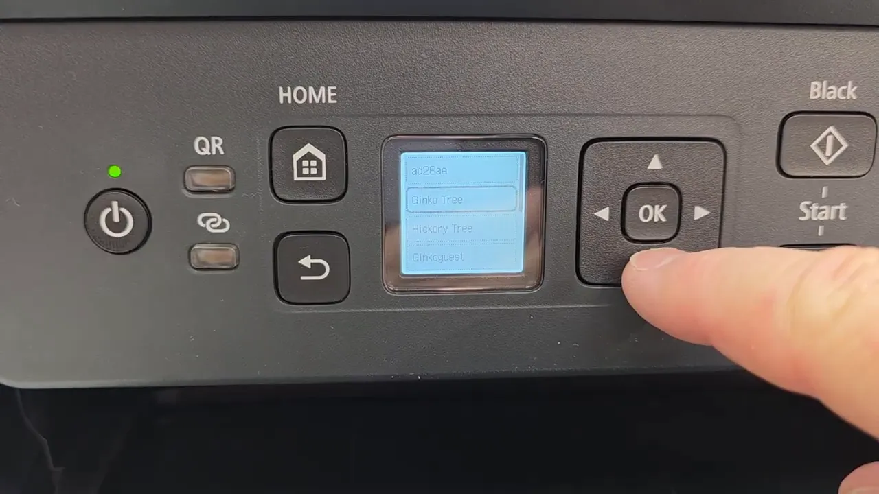 Printer screen showing detected Wi-Fi networks list
