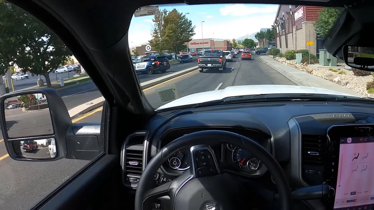 Driver point-of-view in a Ram 2500 showing the road ahead, surrounding traffic and good forward visibility