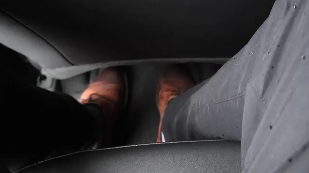 Back-seat legroom and footwell with passenger's feet in rear of truck