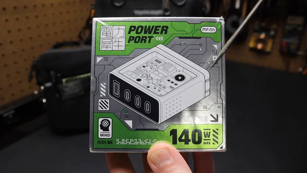 Front view of the MFISH 140W wall adapter showing four charging ports