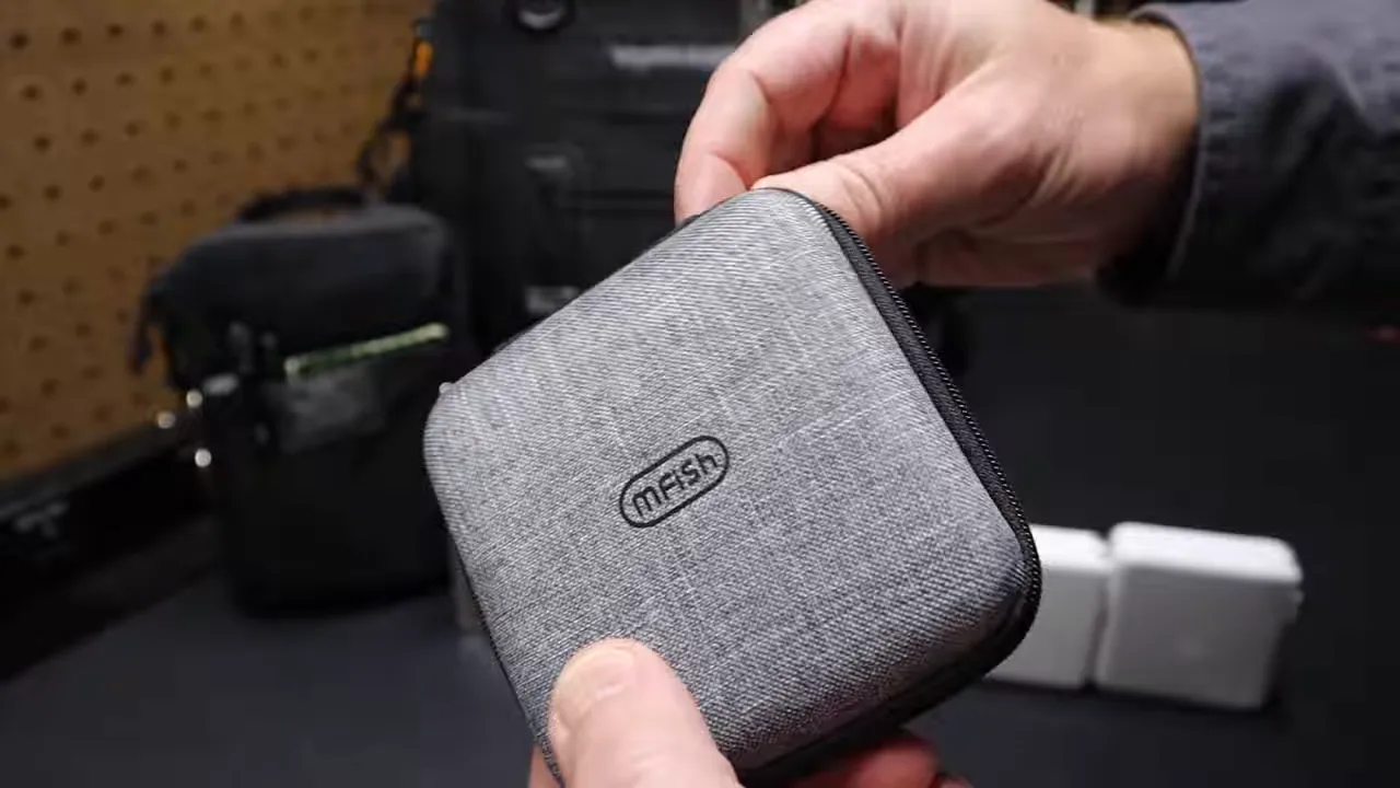 Thick MFISH 4-in-1 cable coiled inside its branded zippered carrying case