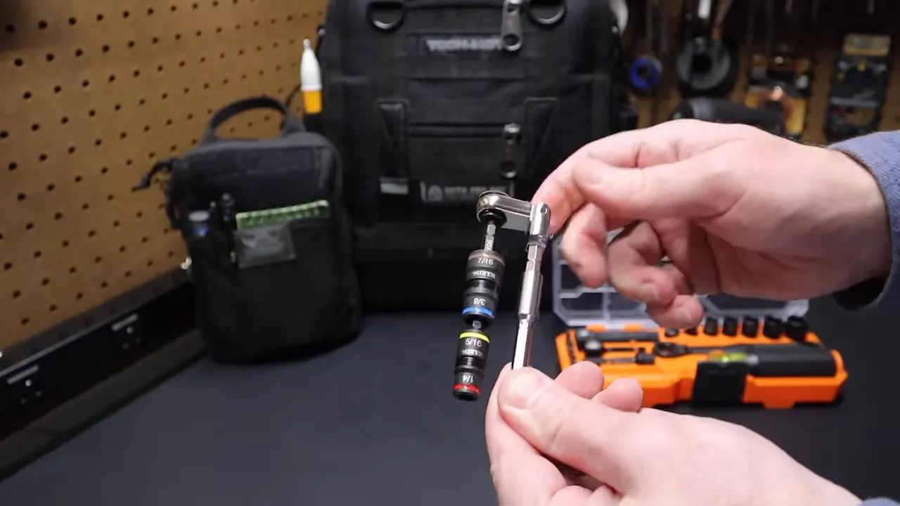 Klein starter kit flip sockets laid next to ratchet for compact EDC combo