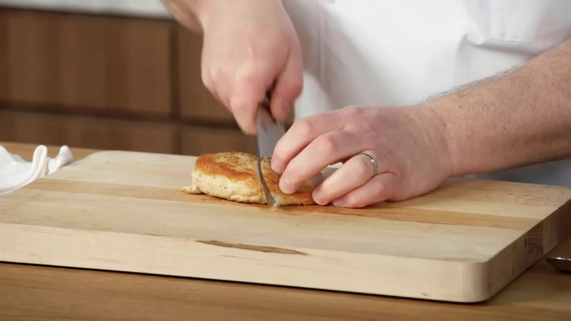 Plating chicken breast with pan sauce