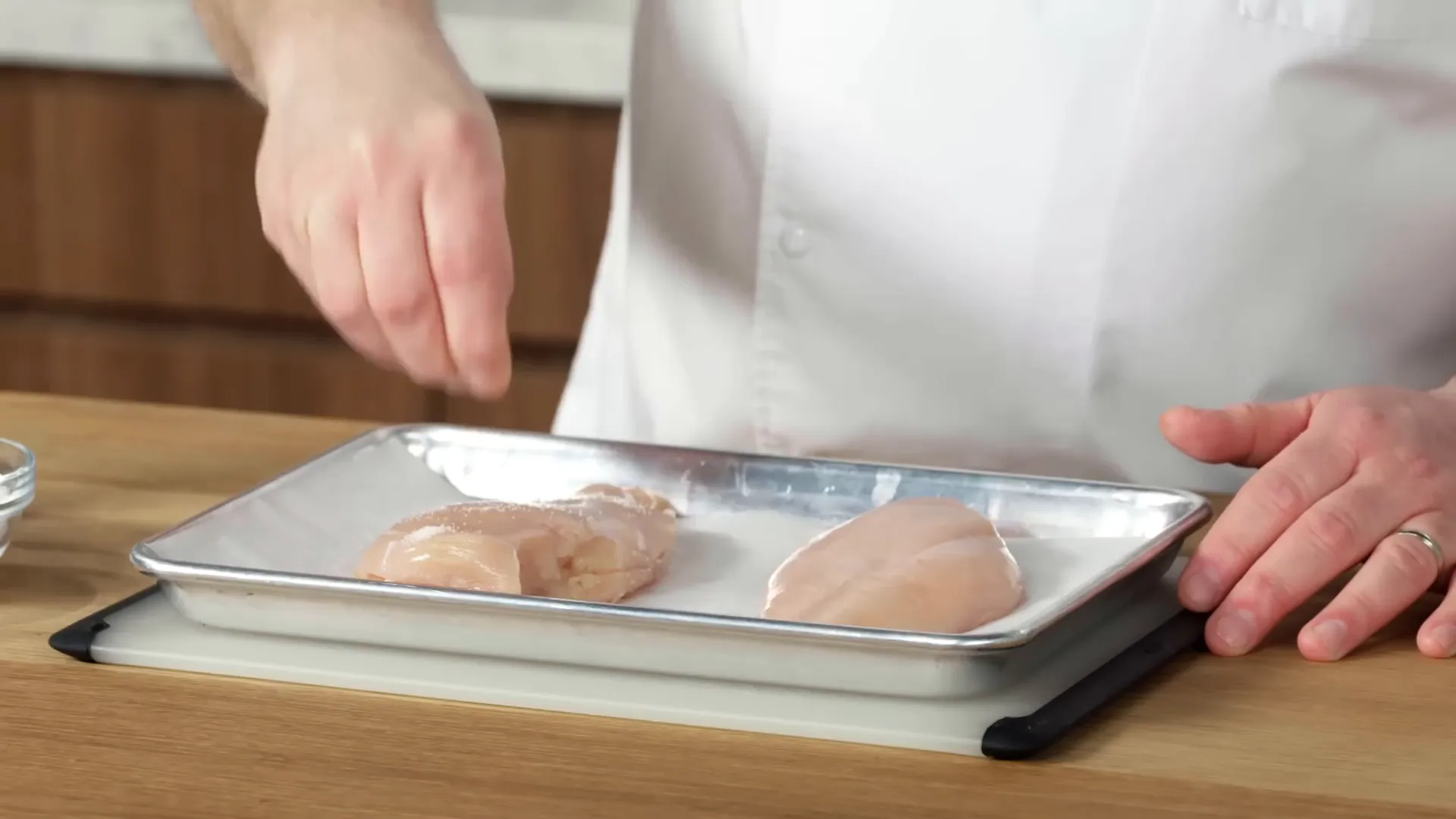 Preparing chicken breast for cooking