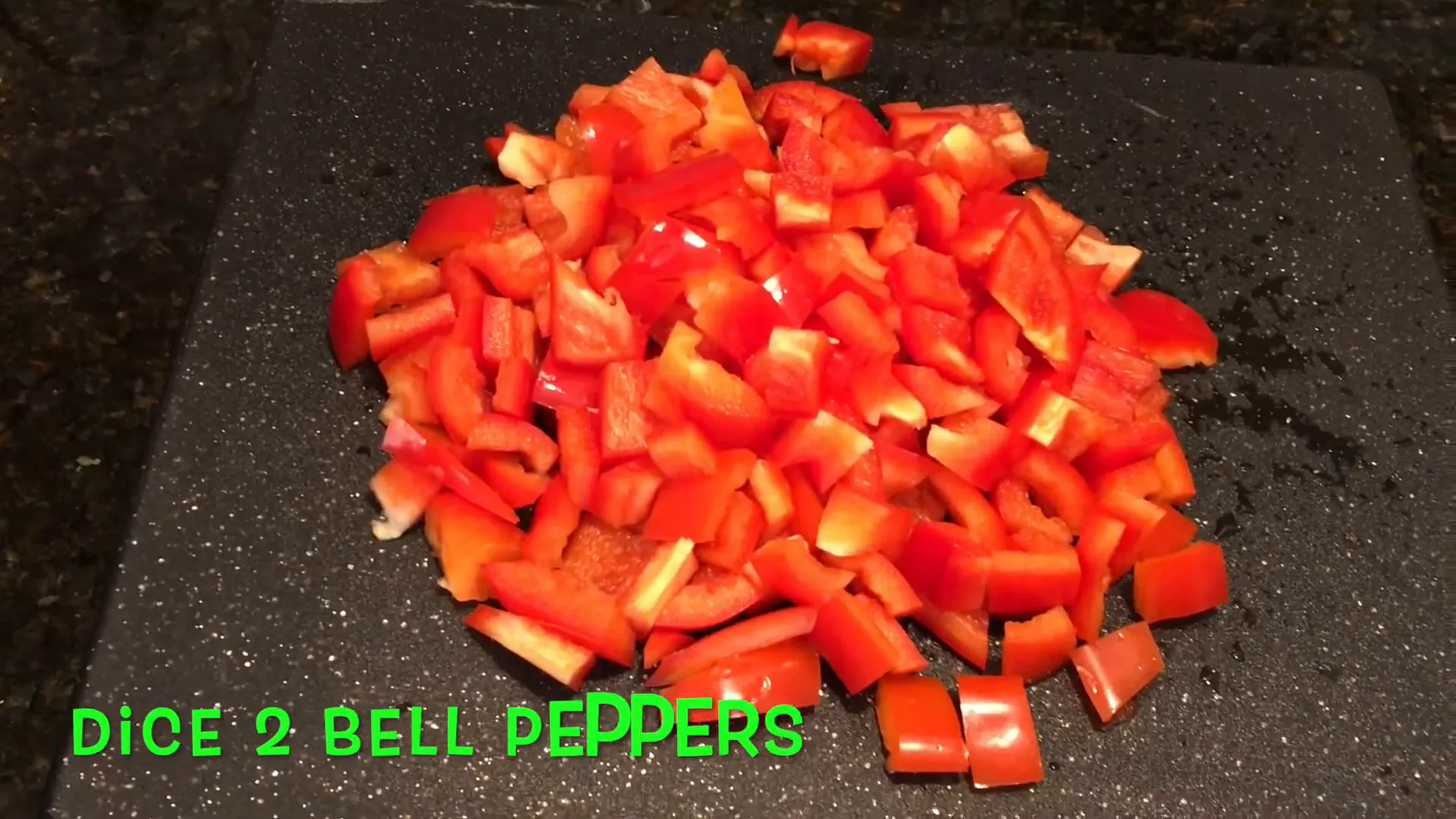 Dicing red bell peppers.