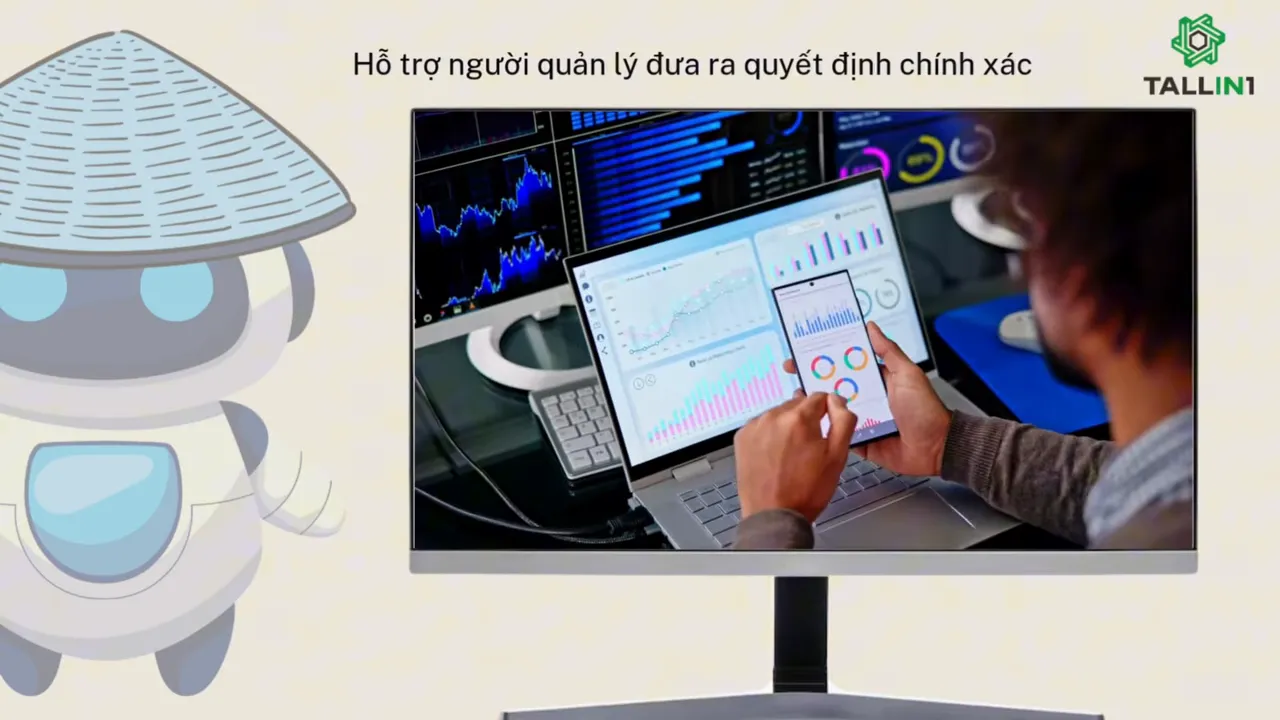 Người đang phân tích biểu đồ dữ liệu trên máy tính bảng và màn hình máy tính