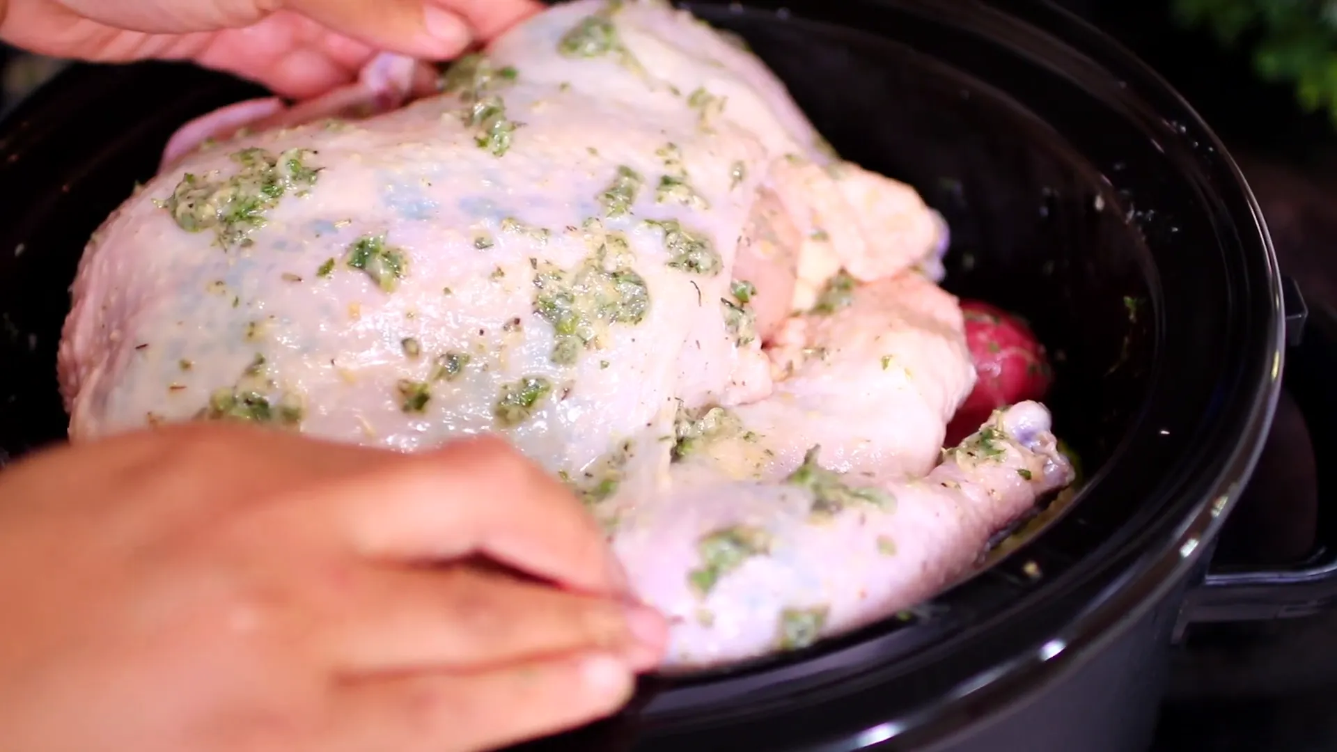 Assembling chicken and vegetables in the slow cooker