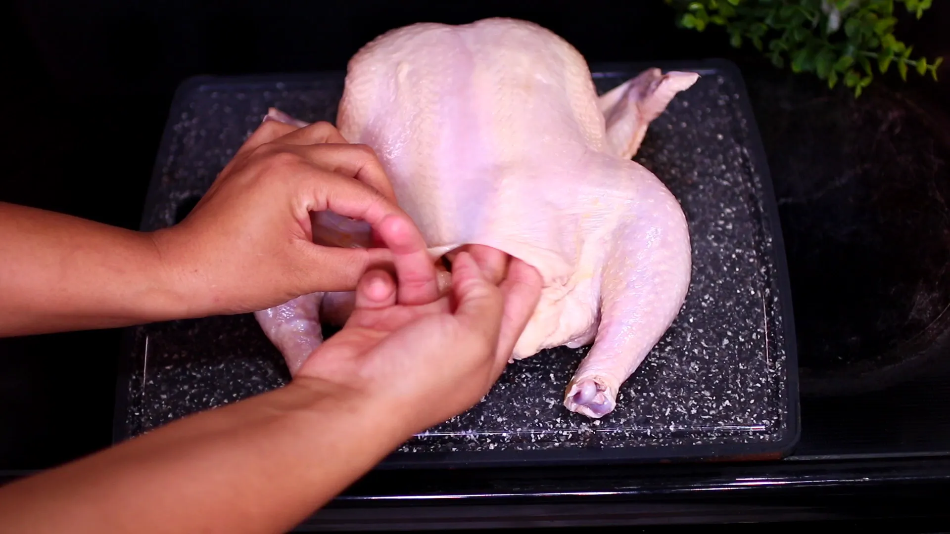 Separating the skin from the chicken
