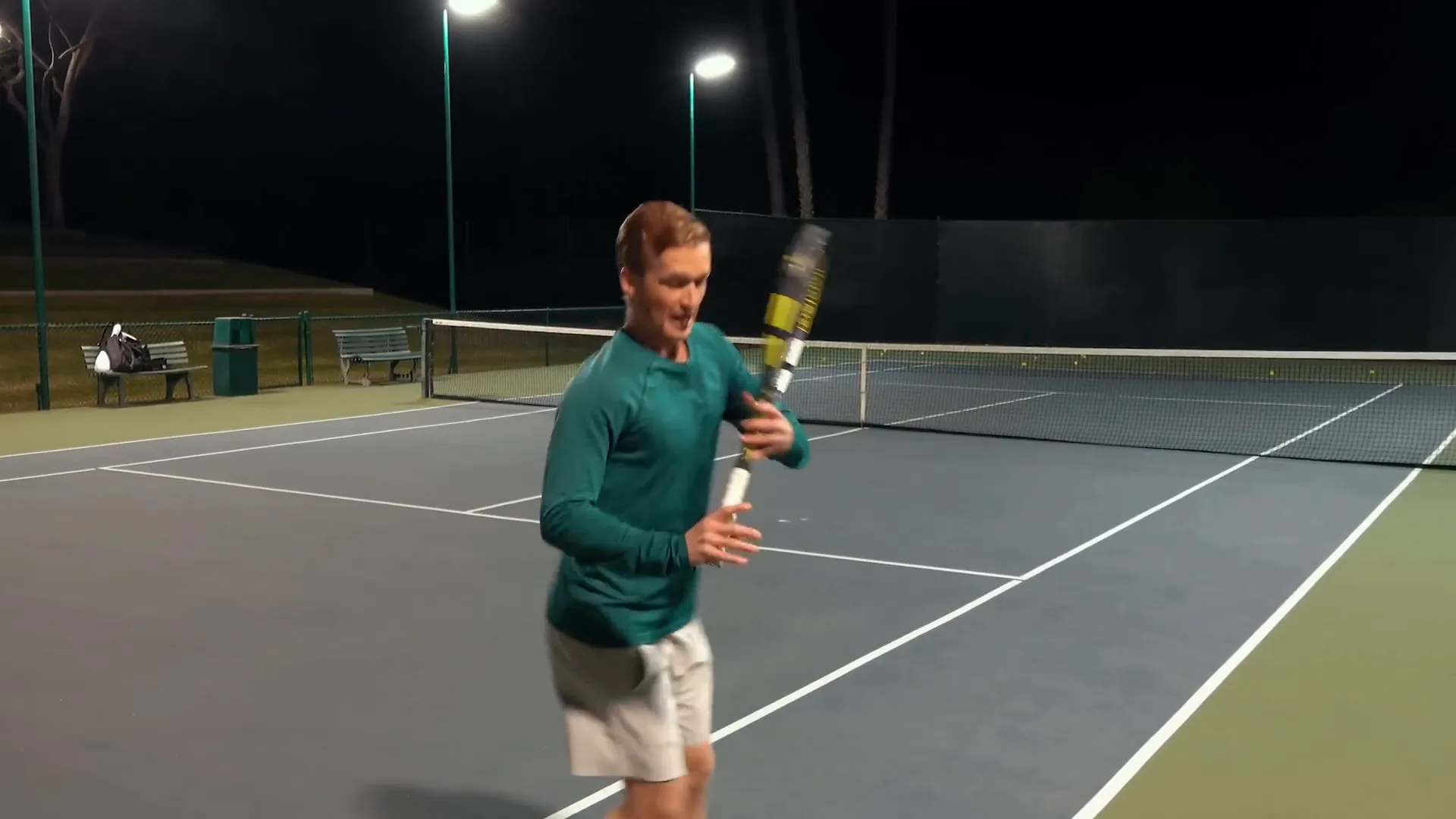 Backswing position showing wrist extension and racket angle