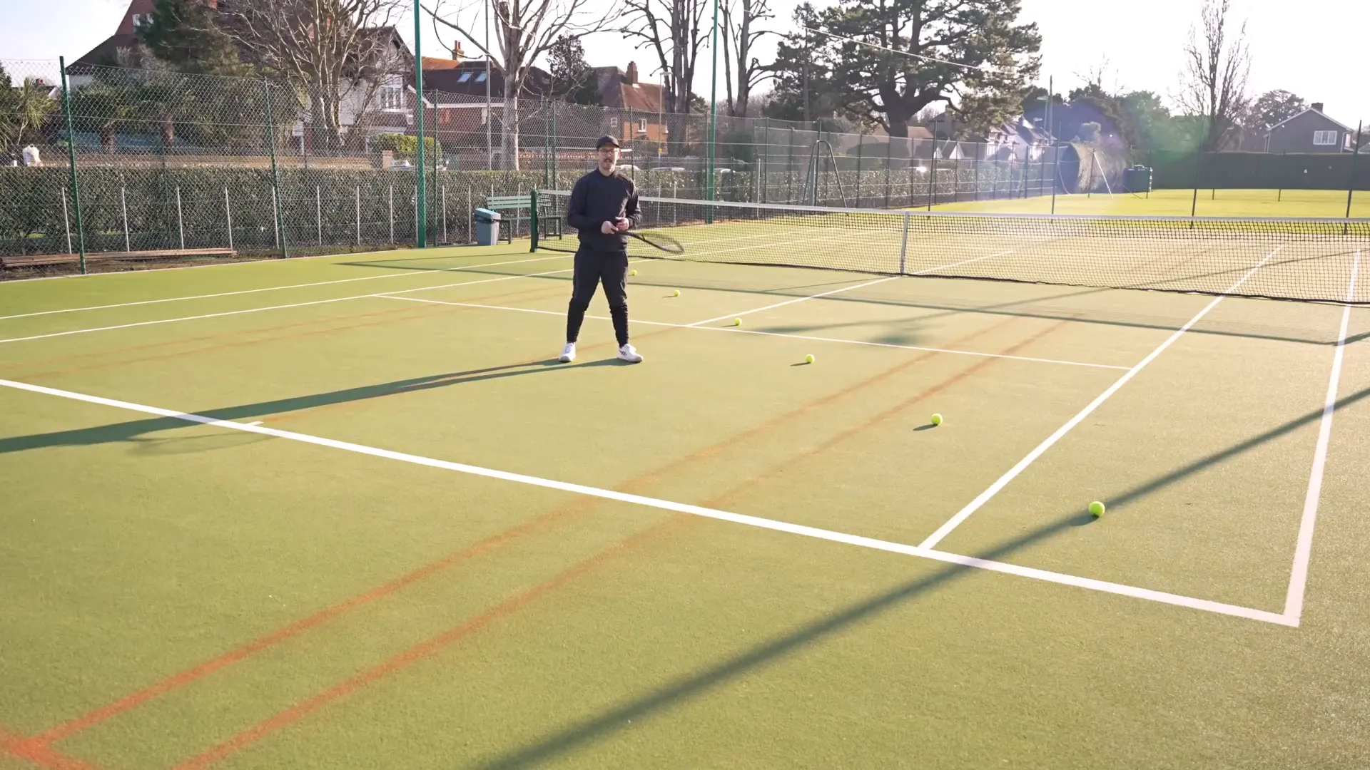 Court split into diagonal triangles for doubles coverage