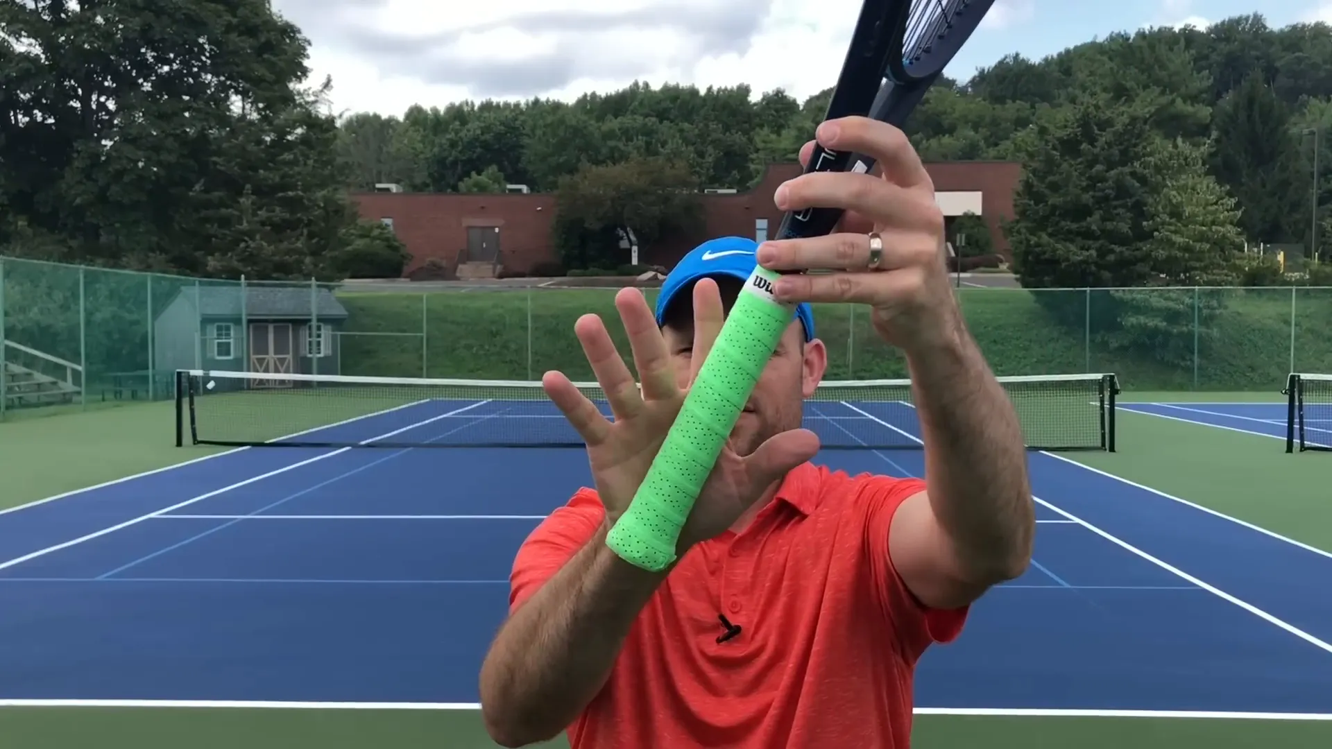 Hand demonstrating continental grip alignment on bevel two