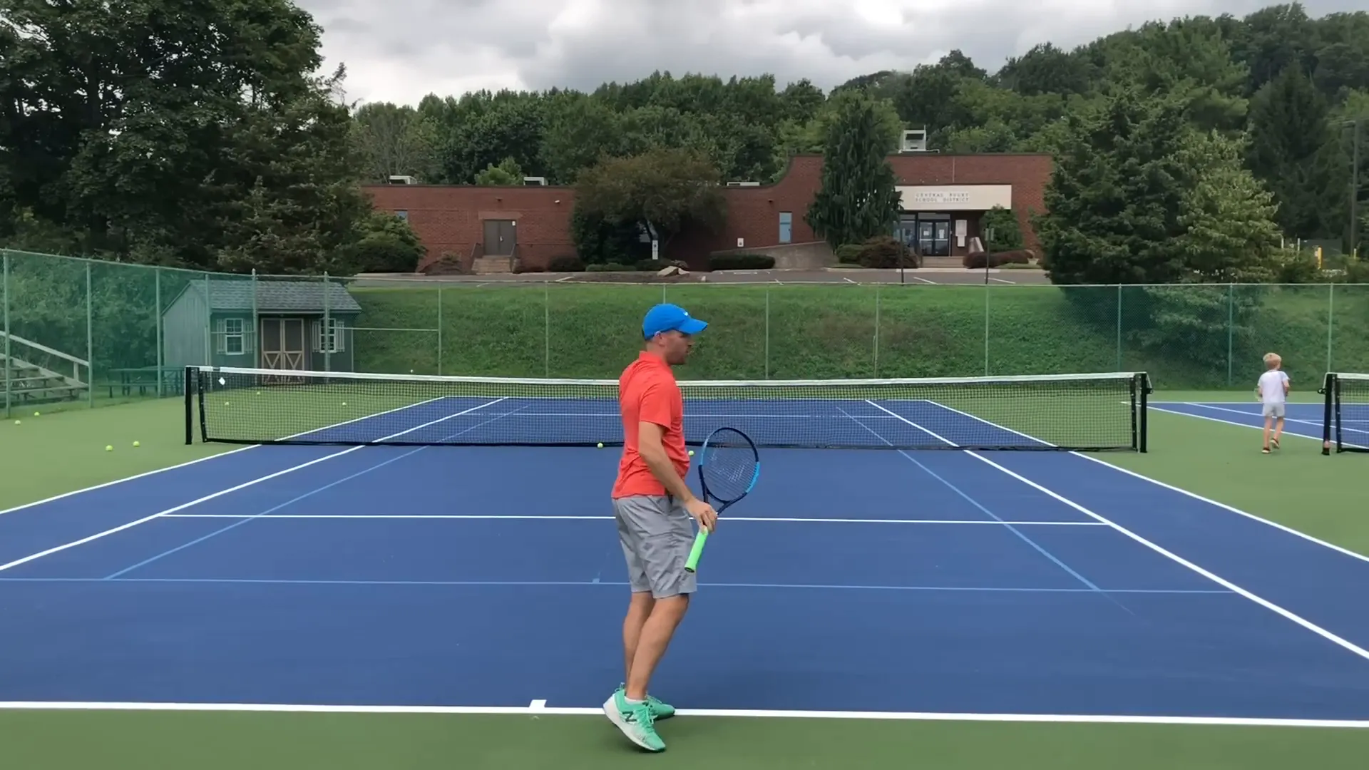 Body exploding forward into the right during serve follow-through