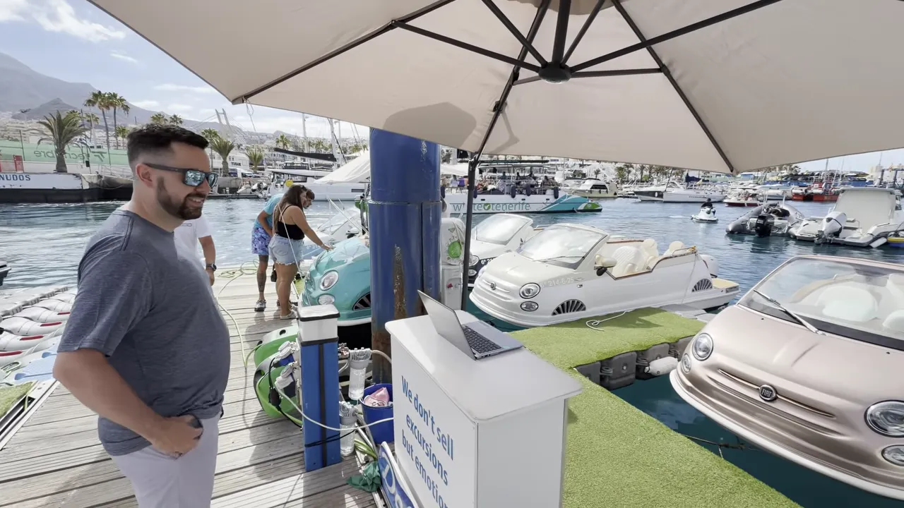 White Fiat 500 inspired boats moored at Puerto Colon marina in Tenerife