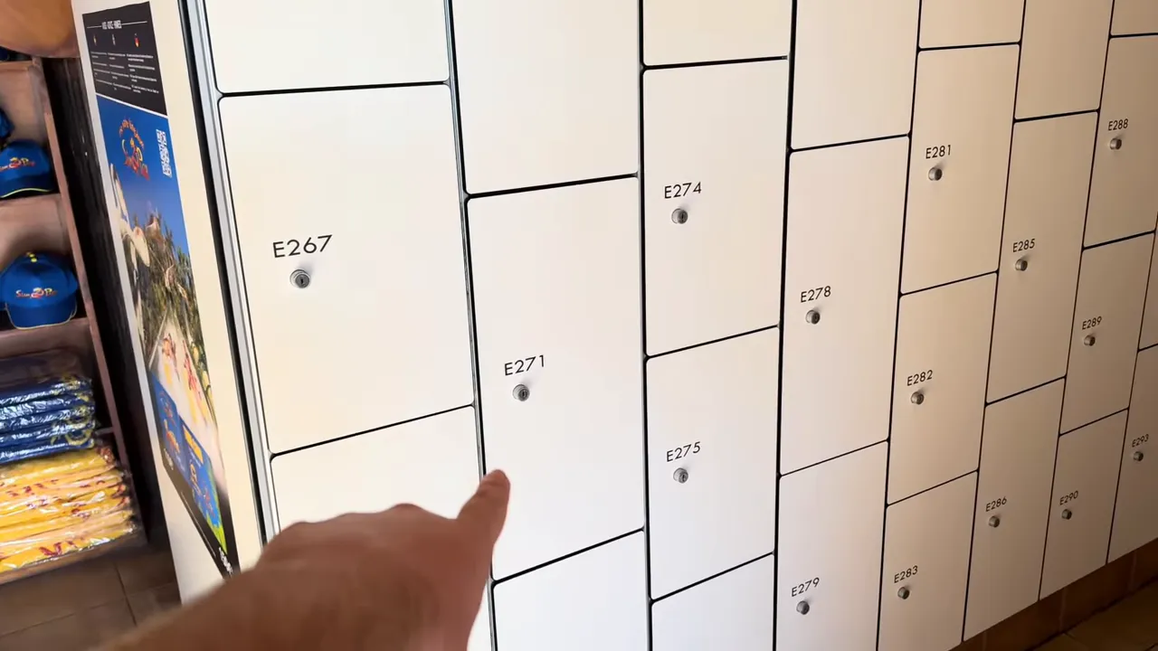 Siam Park Wave Palace locker area with numbered lockers and signage