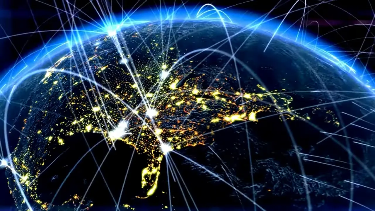 Globe at night with illuminated cities and connecting arcs showing global network connections