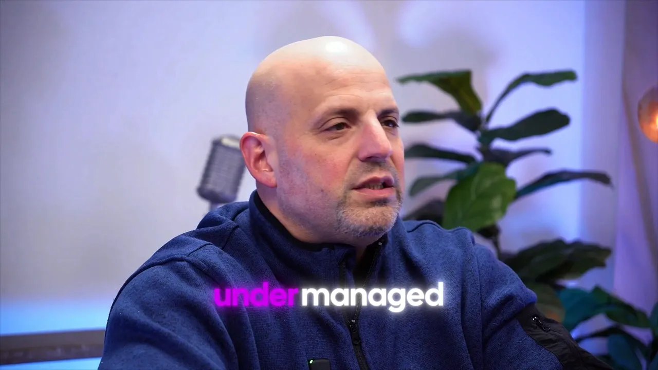 podcast host with on-screen text 'under managed' illustrating under-managed franchise units.