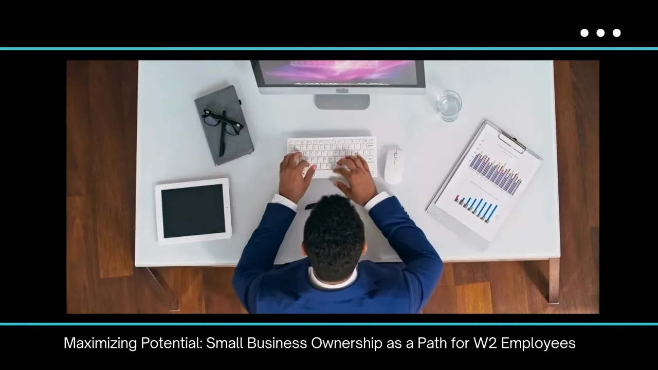 Overhead view of a desk with a computer, keyboard, tablet and printed charts showing business financial graphs.