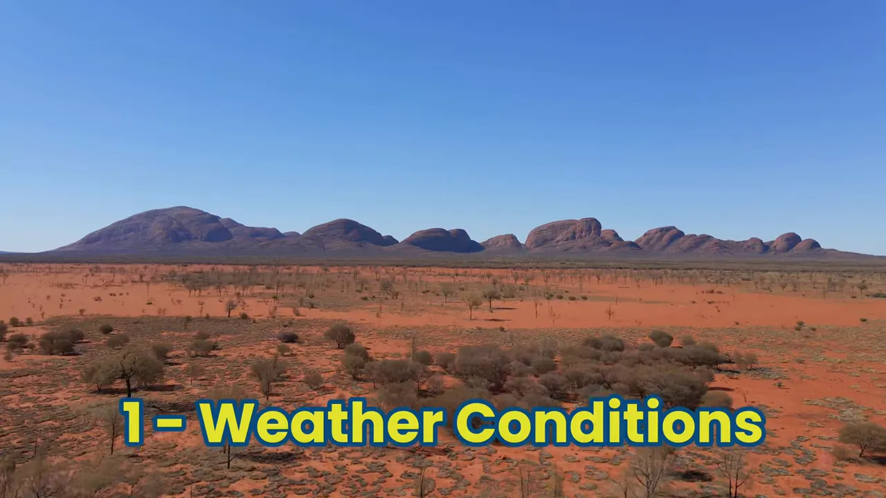 Australian red desert plain with domed rock formations and the text '1 - Weather Conditions' overlay