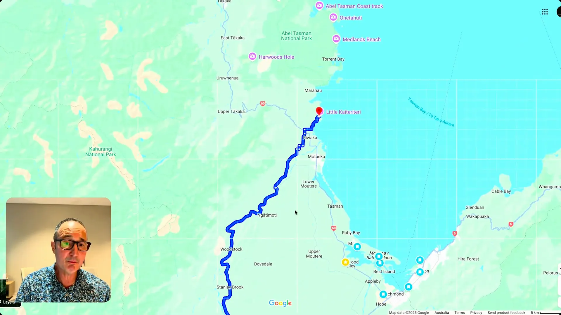 Road sign pointing to Tapawera and Abel Tasman National Park