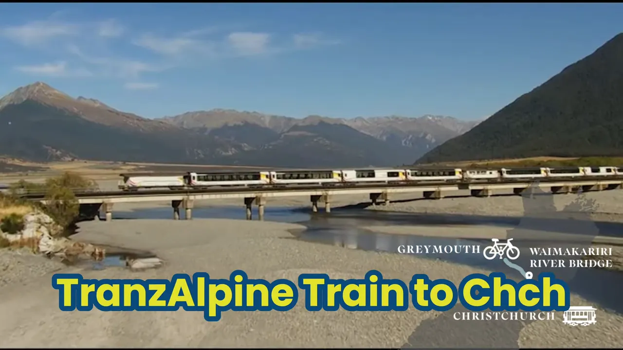 TranzAlpine passenger train crossing a river bridge with mountains in the background and on-screen text 'TranzAlpine Train to Chch'.