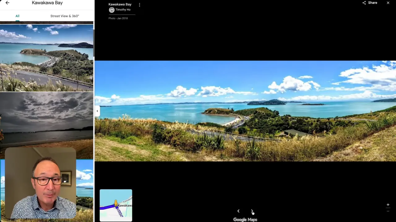 Panoramic daytime view of Kawakawa Bay from a headland with turquoise water and small sandy coves