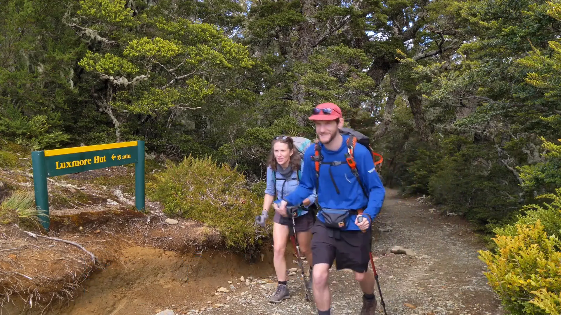 Hiking gear essentials including boots and day pack