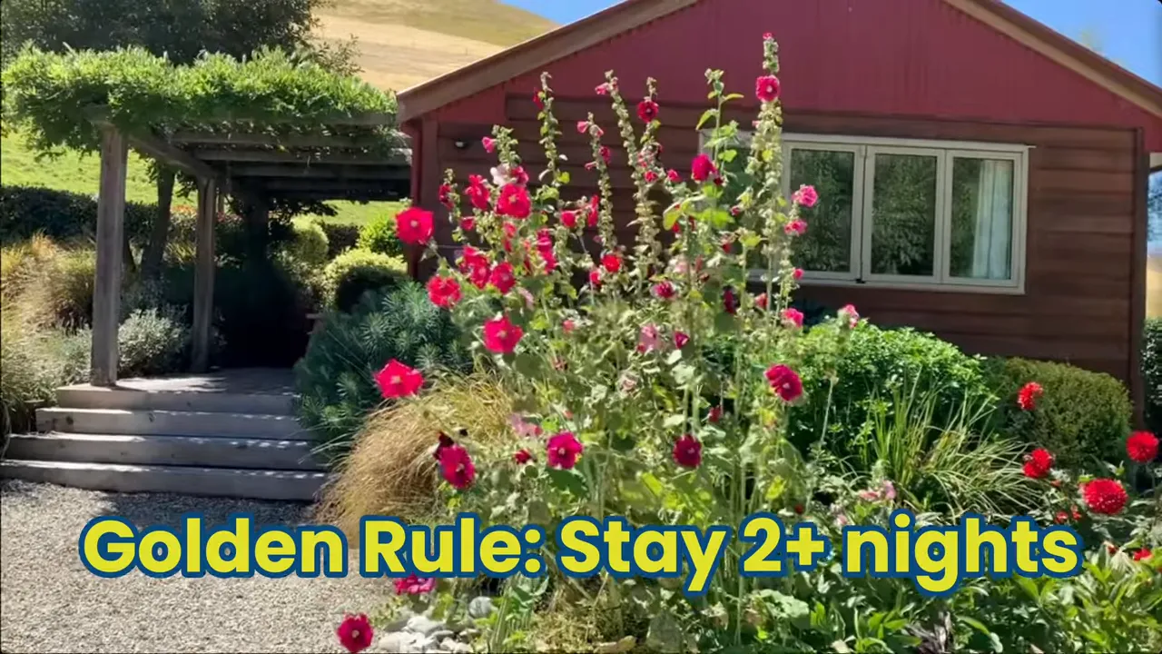 Garden cottage with flowers and on-screen text 'Golden Rule: Stay 2+ nights'