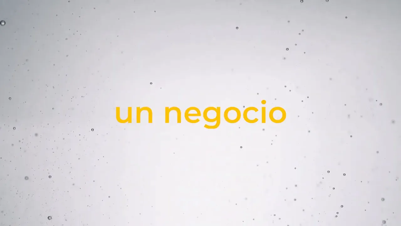 Texto grande en pantalla que dice 'un negocio' sobre fondo claro y minimalista.