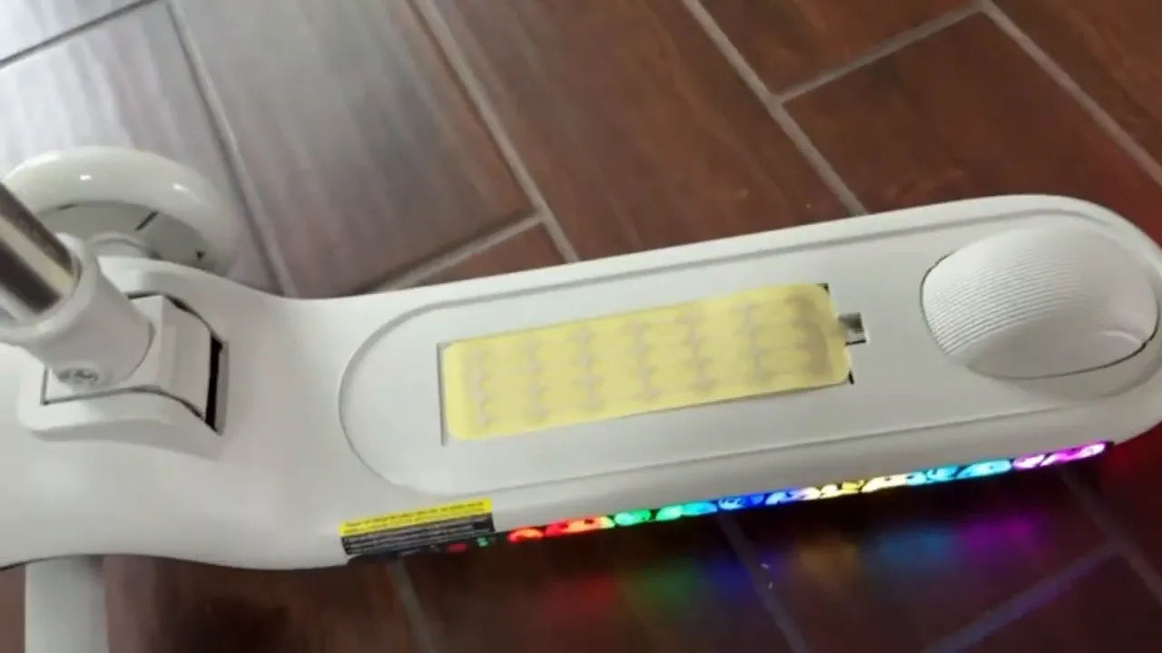 Fantic Ride K9 Pro kids three-wheel electric scooter deck and LED strip close-up indoors