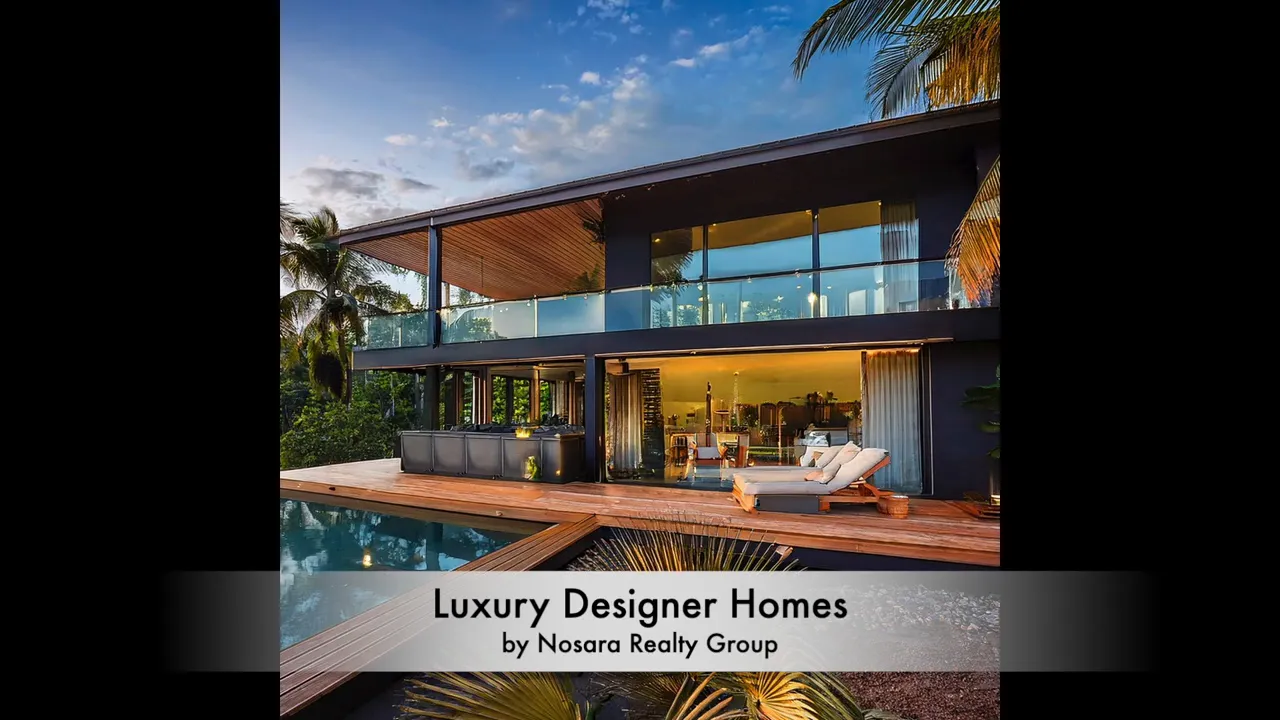Large modern glass home with text identifying luxury designer homes