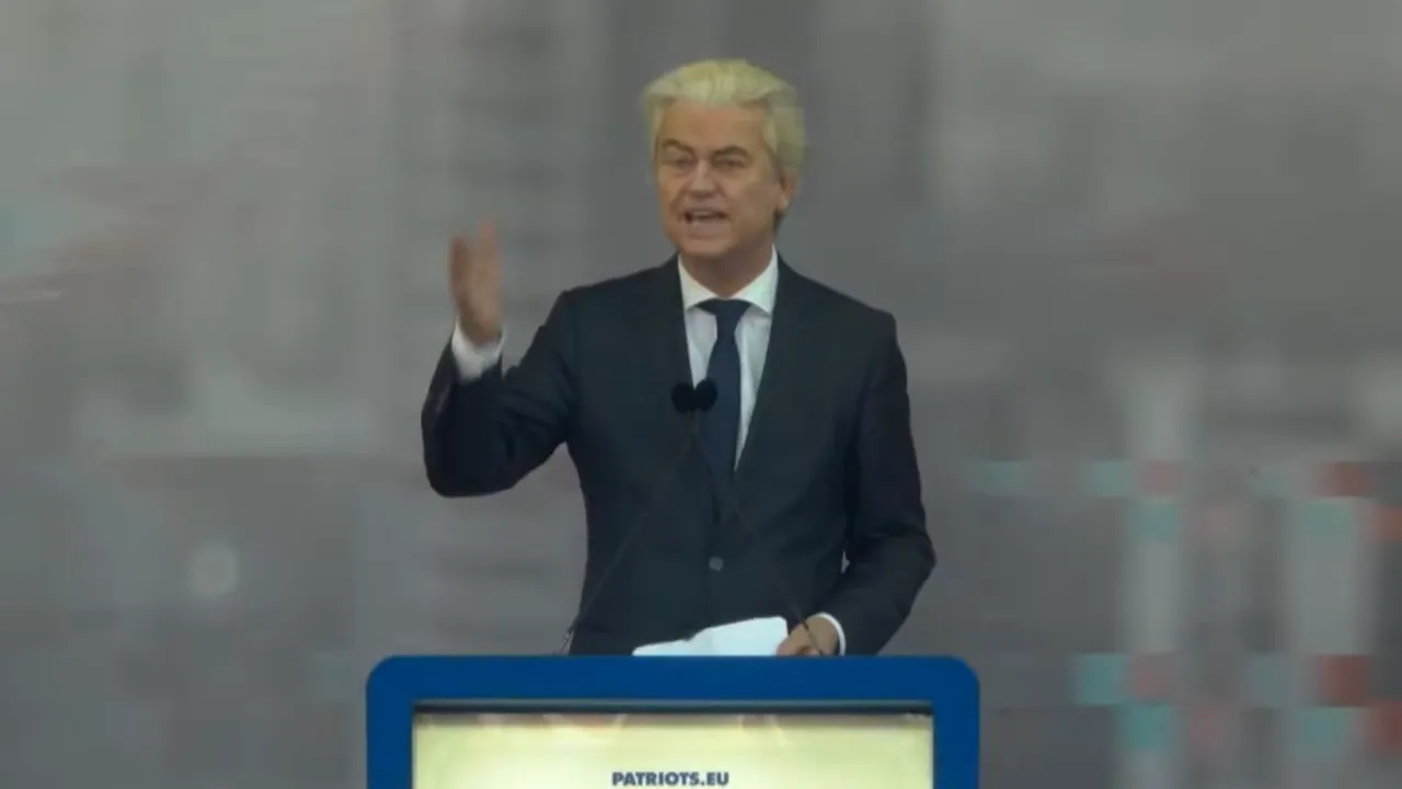 Geert Wilders speaking at a Patriots.eu podium with raised hand