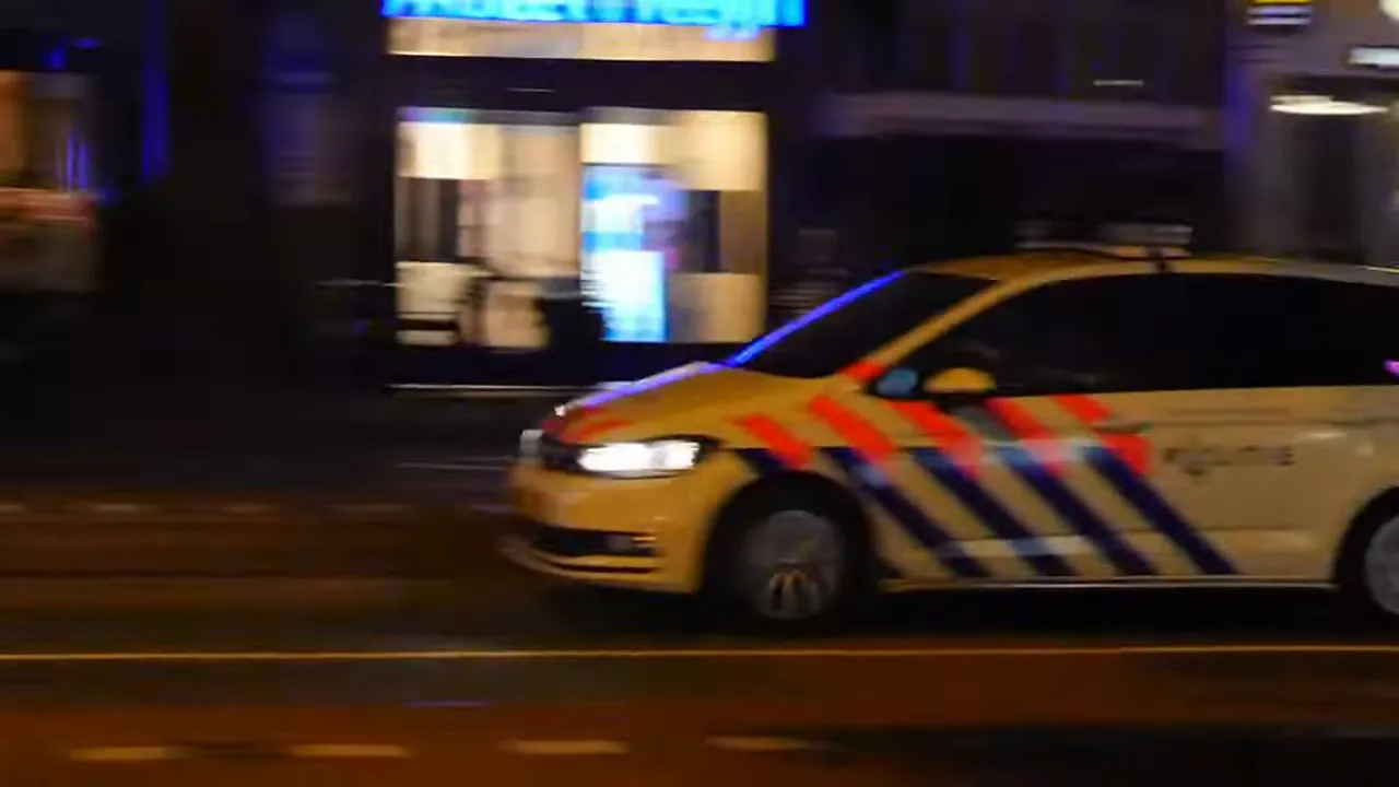 Police or security vehicle on a street with on-screen text indicating “CRIME.”