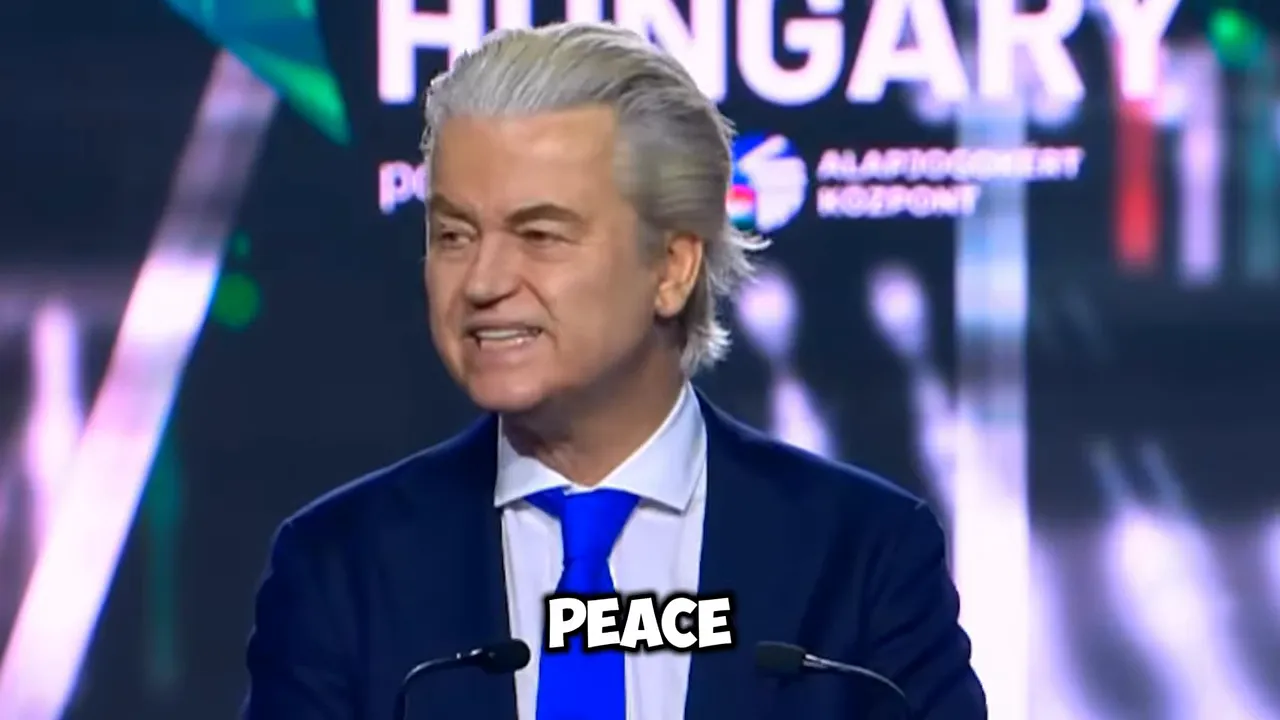 speaker at podium on a blue stage with the word Hungary visible behind him