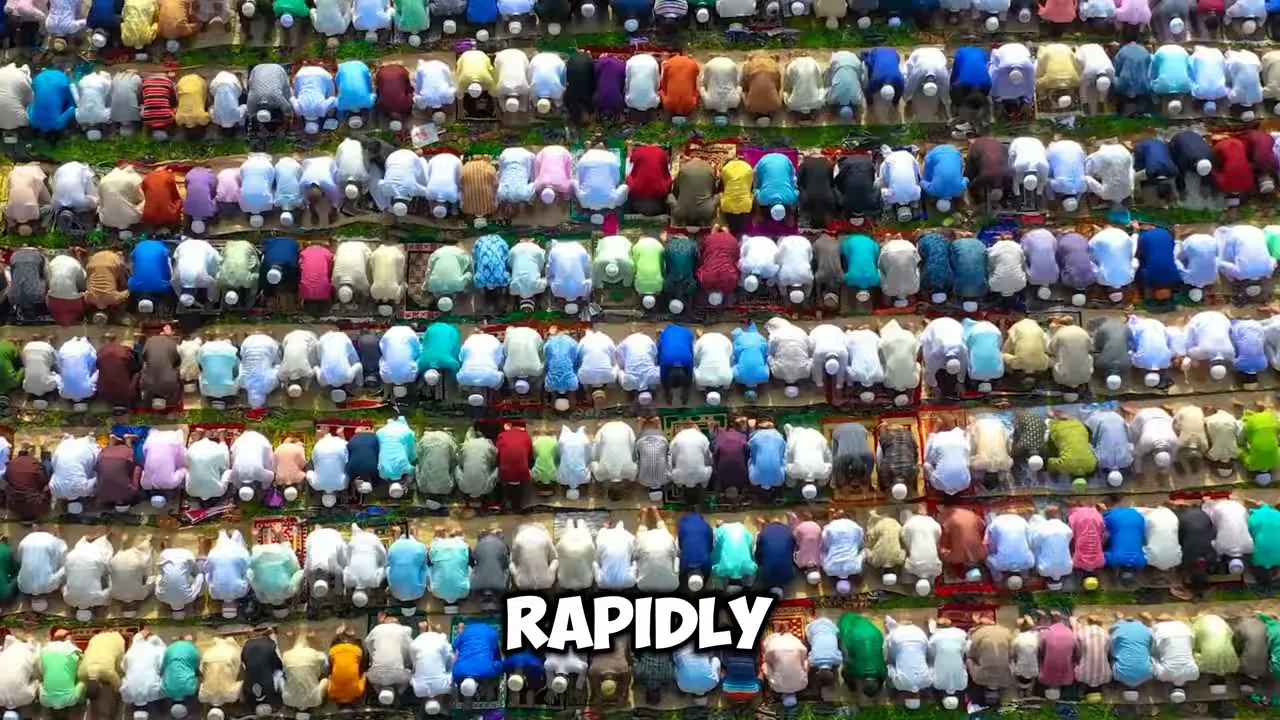 large outdoor prayer gathering with rows of people kneeling