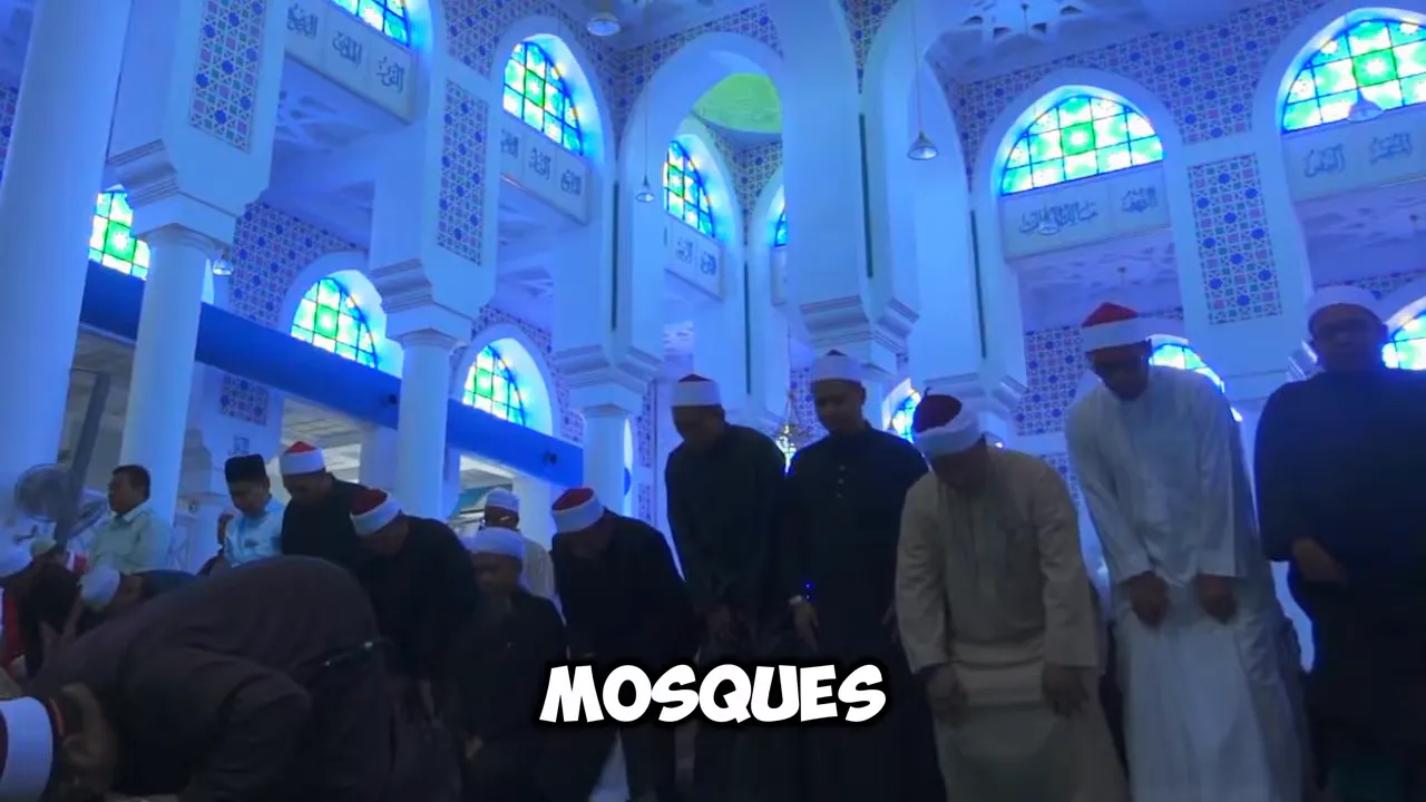 interior of a mosque with stained glass windows and people standing in prayer